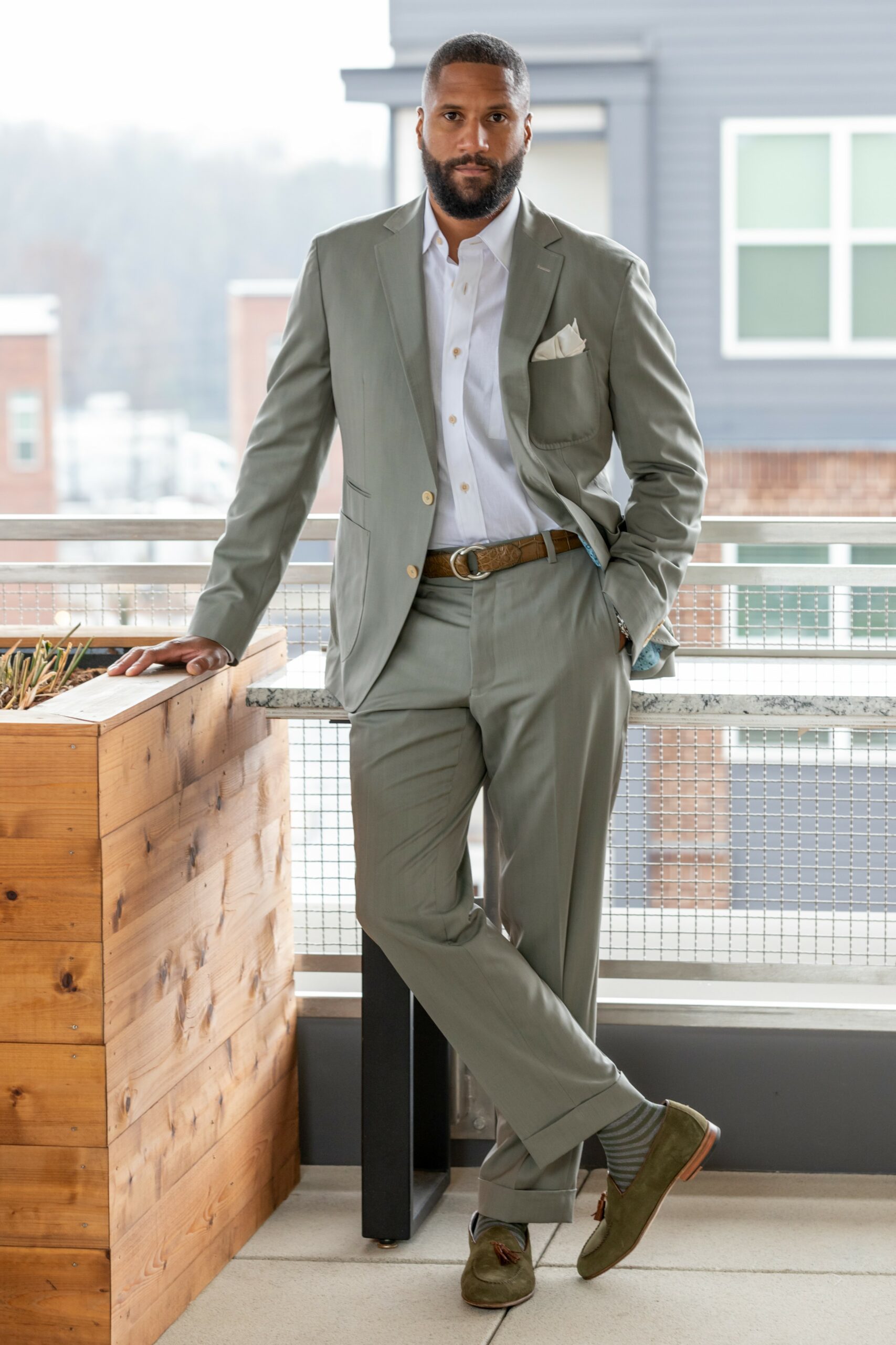 Light olive herringbone custom-made suit made with Super 140's eco-friendly wool